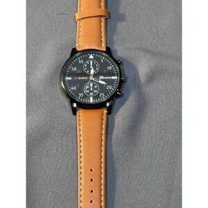 Geneva quartz watch with a black face and a brown leather strap. #218